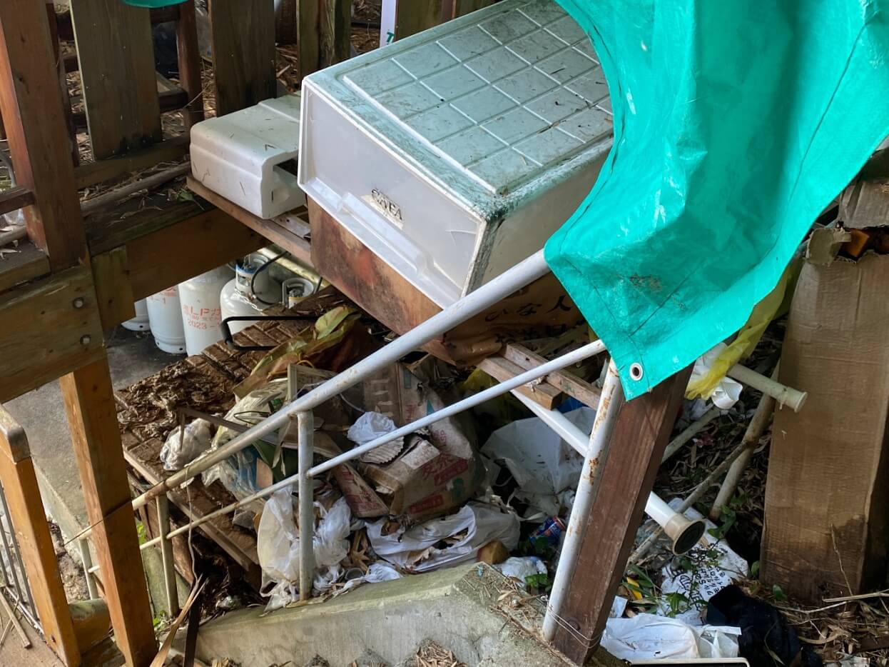 Garbage stacked high in a hoarder house in Japan.