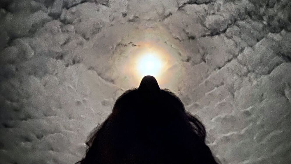 Matt Ketchum of Akiyaz looking up at the full moon on Hachijojima, Tokyo, Japan