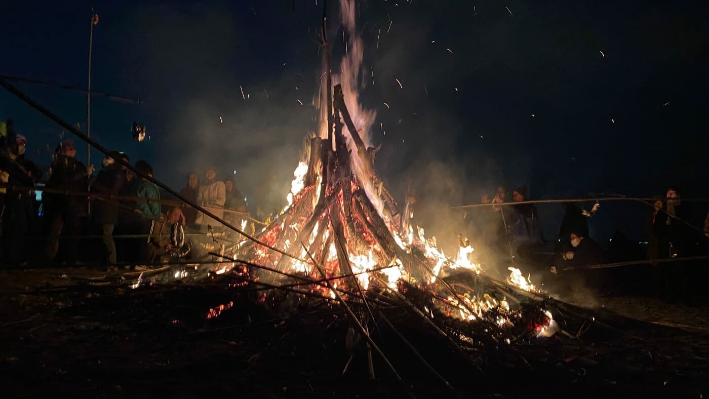 A large bonfire at night on the beach at Oiso in Kanagawa, Japan.