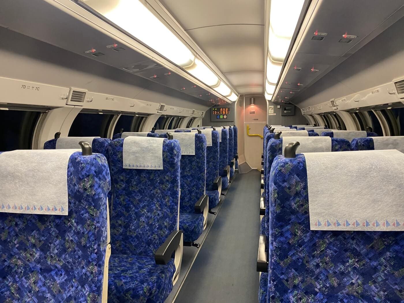 Green car cabin on the Tokaido train line.